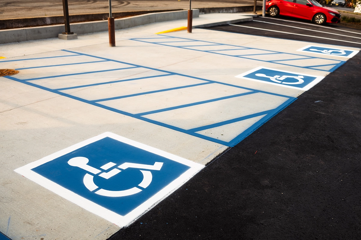 ADA parking stall with blue striping and access aisle markings